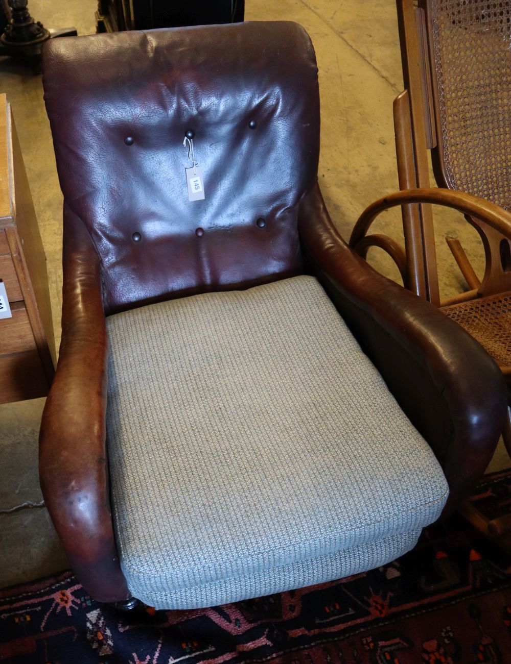 A Victorian armchair, new upholstery to sides and back, width 72cm, height 74cm